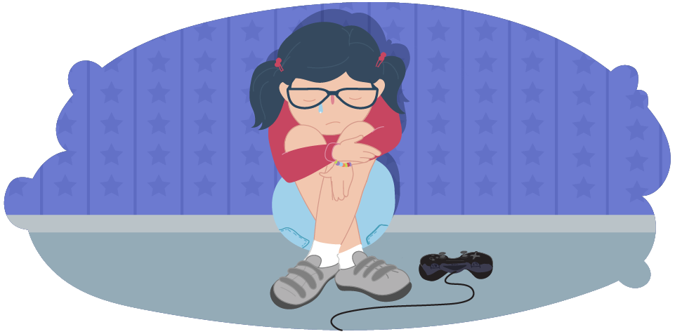 Child sits with sad body language next to a gaming console